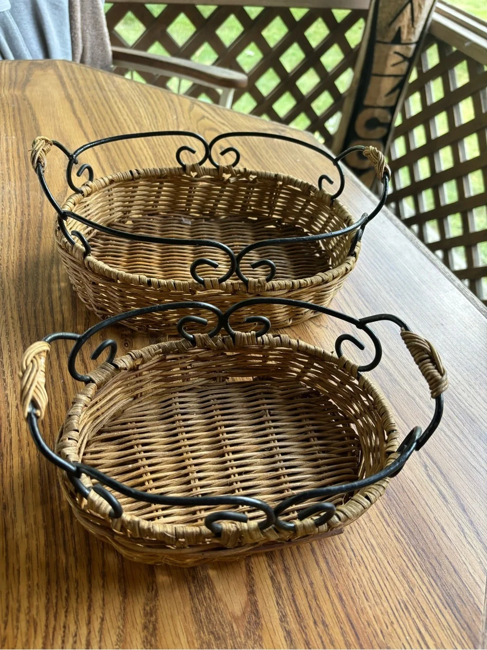 Two Woven Natural Rattan Baskets with Black Metal Handles Big 10x7, Small 8x5